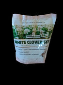Bag of Jonathan Green White Clover Seed on a wooden surface